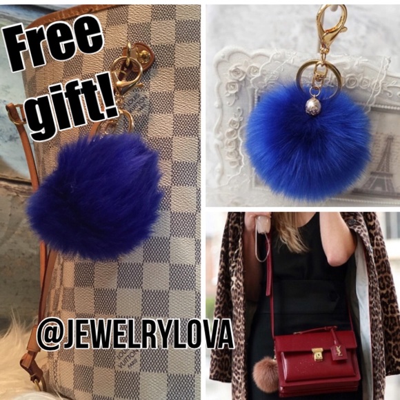 Pom Pom faux fur keychain in Blue