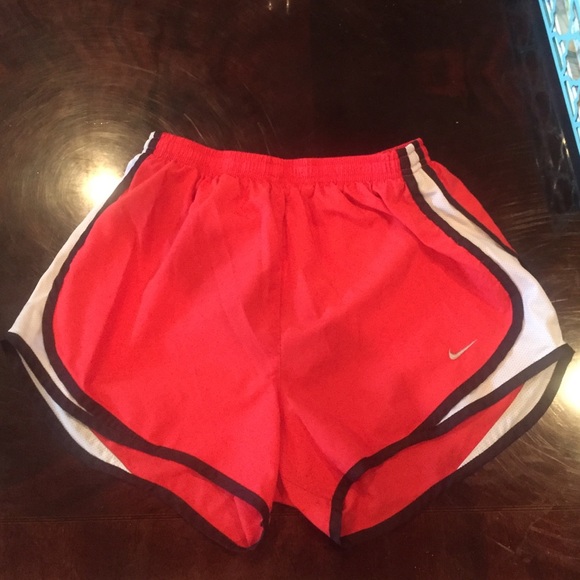 Red Nike shorts
