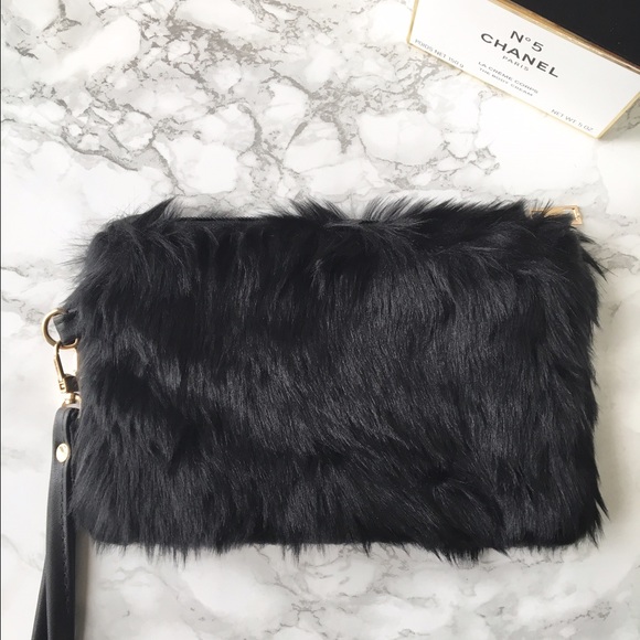 Handbags - Fur ball wristlet in black