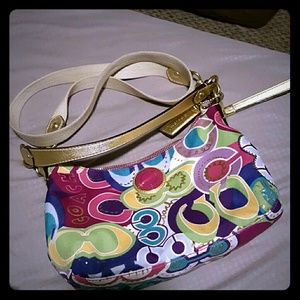 Multi colored signature Coach crossbody purse