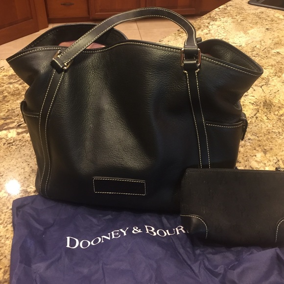 Dooney and Bourke leather handbag and cosmetic bag