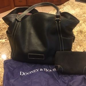 Dooney and Bourke leather handbag and cosmetic bag