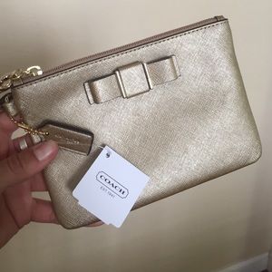 NTW gold Coach wristlet