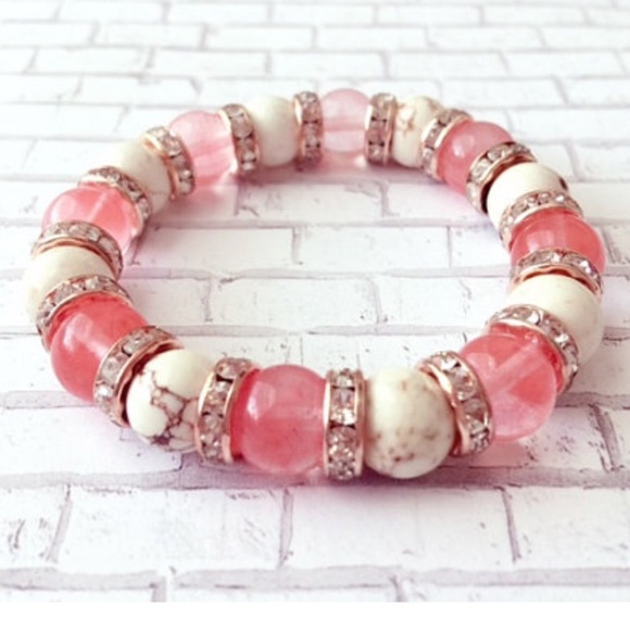 Pink and white handmade beaded bracelet.