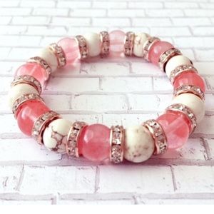 Pink and white handmade beaded bracelet.