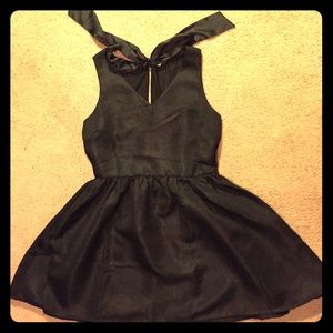 Black mini dress with zipper and tie closure