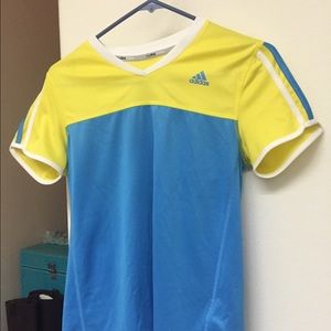 Adidas yellow and blue top.