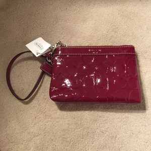 Brand new red patent leather coach wristlet