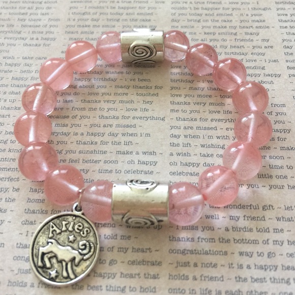 Zodiac pink beaded bracelet.