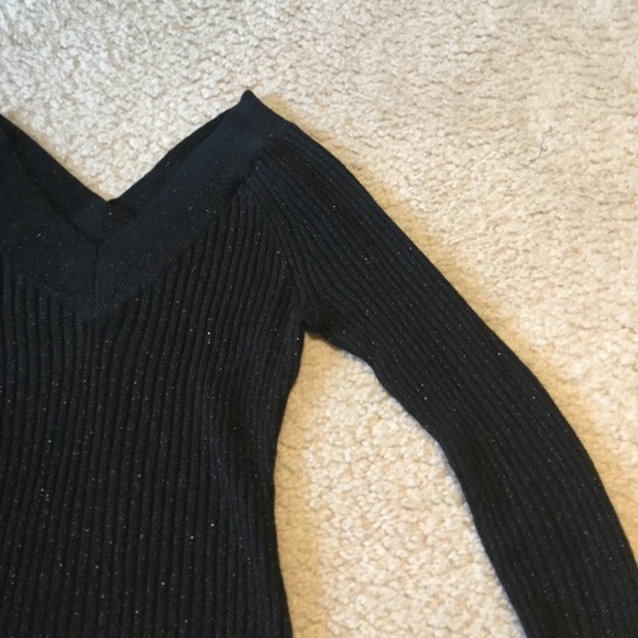 Sparkly black top with long sleeves. - Picture 2 of 2