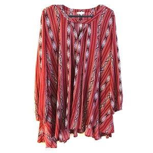 Red long sleeve flowey dress. Keyhole neck