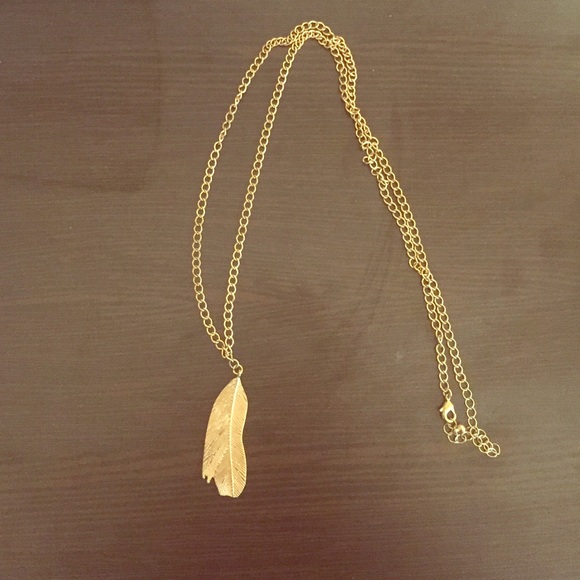 Gold feather necklace