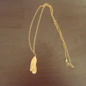 Gold feather necklace