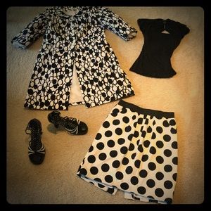 Coat, skirt, top, heels.