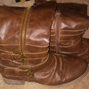 Carlos santana riding boots.