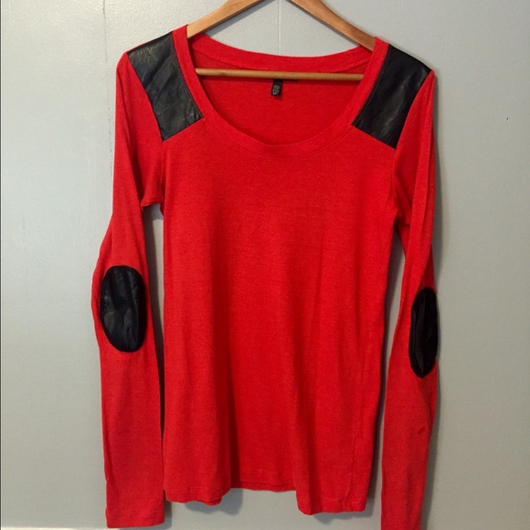 Red top with faux leather details