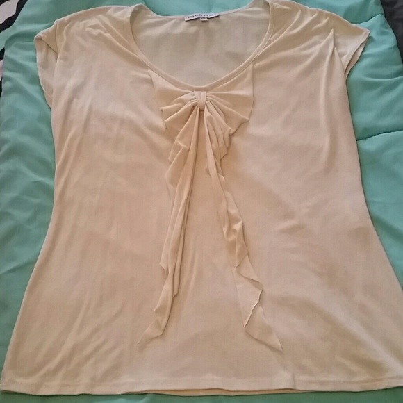 Cream top with bow