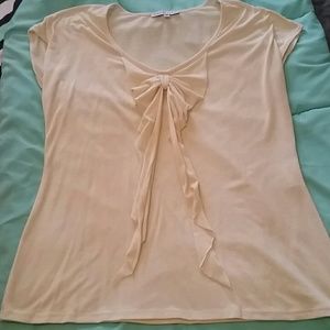 Cream top with bow