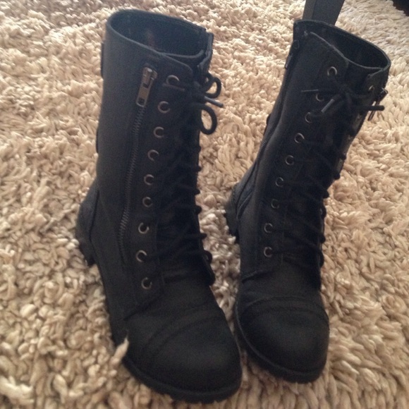 Black zippered combat boots