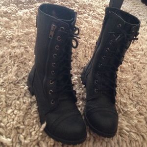 Black zippered combat boots