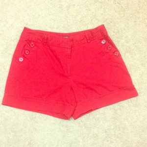 Cute red shorts with button detailing