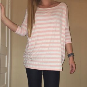 Pink and white stripped Piko shirt