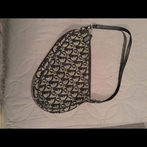 Small sized. Authentic Christian Dior saddle bag.