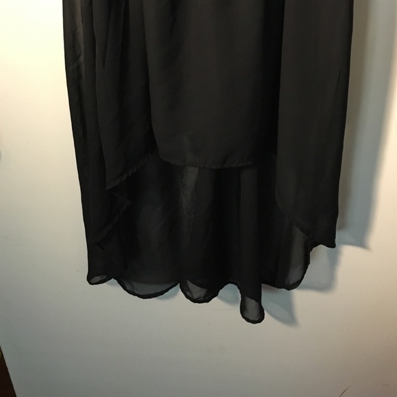 Asymmetrical dress. Sheer material - Picture 2 of 3