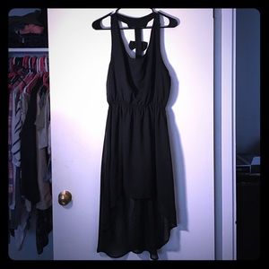 Asymmetrical dress. Sheer material