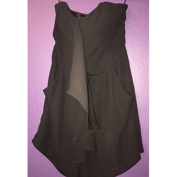 Black strapless jumper.