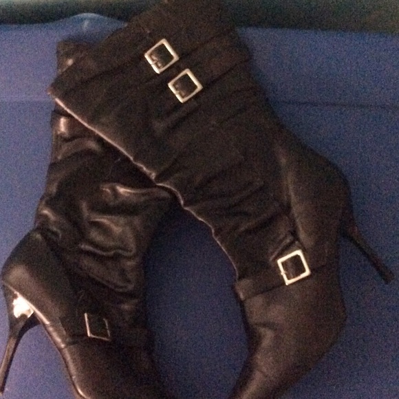 Women's stiletto boots with silver buckle accent