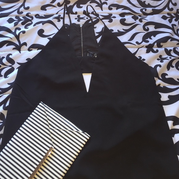 Cutout midi dress with skits down the sides.