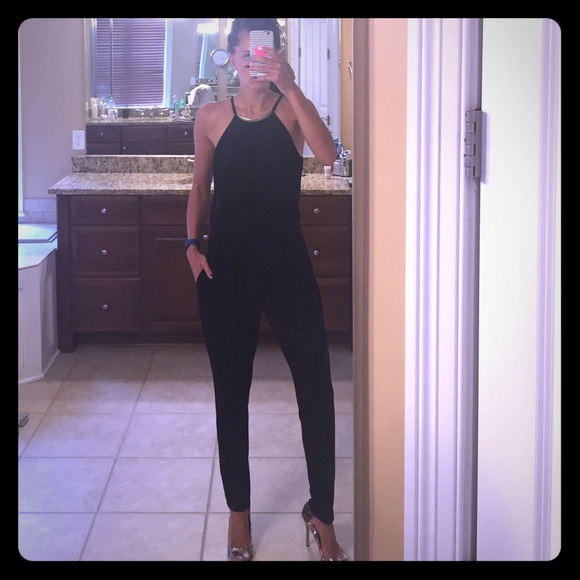 Great for Spring!Brand new with tags black romper!