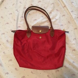 long champ red medium sized purse