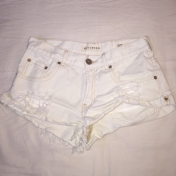 White, frayed shorts.
