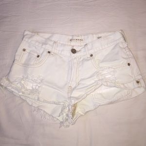 White, frayed shorts.