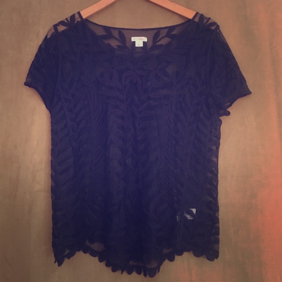 Navy blue top with an intricate design.