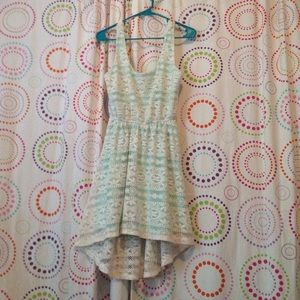 Sleeveless, blue dress with white lace