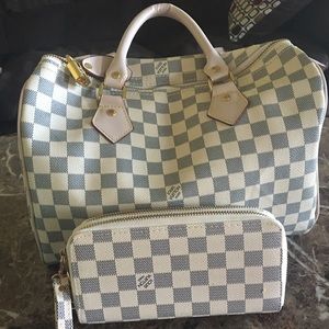 Faux Louie Vuitton speedy bag w/ matching wallet.