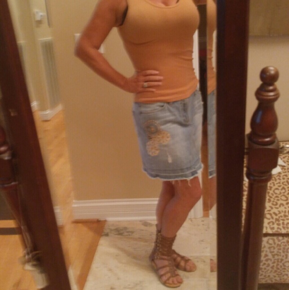 Detailed bead and lace blue jean skirt.