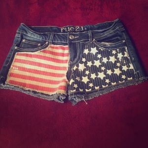 Jean shorts with an American flag design.