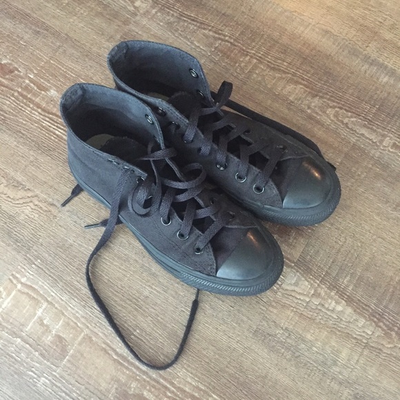 All black hi-top Converse