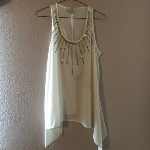 Sheer white sequined blouse