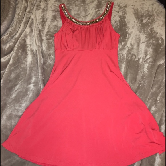 peach dress with bedazzled neckline