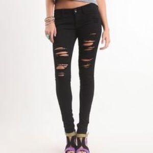 Black distressed skinny jeans