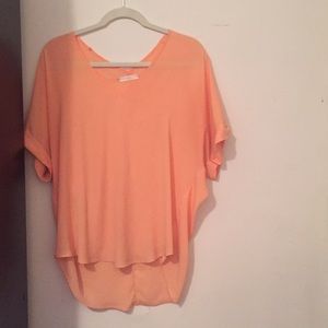 Bright orange top