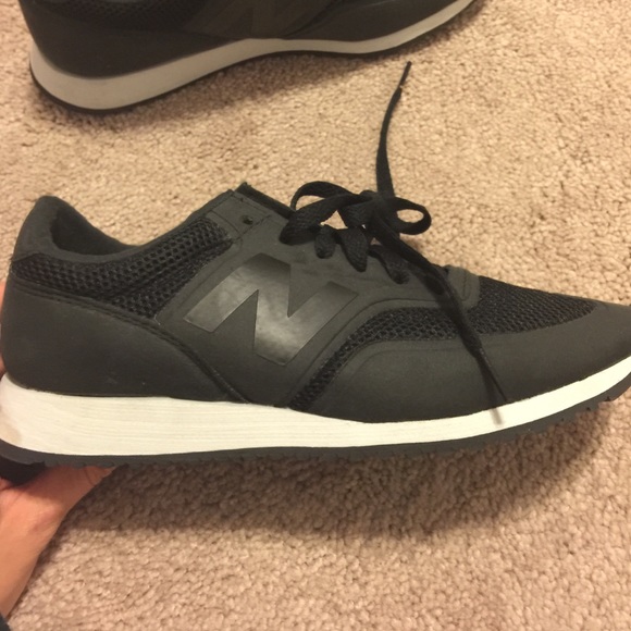 New Balance black sneakers