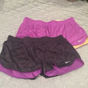 Two pairs of Nike mesh shorts with drawstring