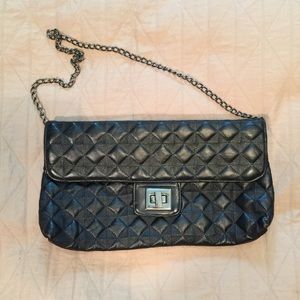 Black geometric texture clutch