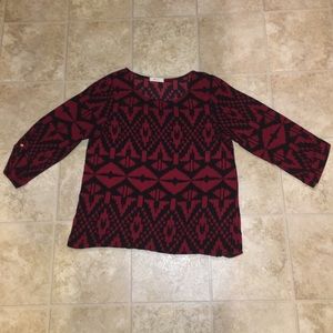 Super cute size small patterned shirt!